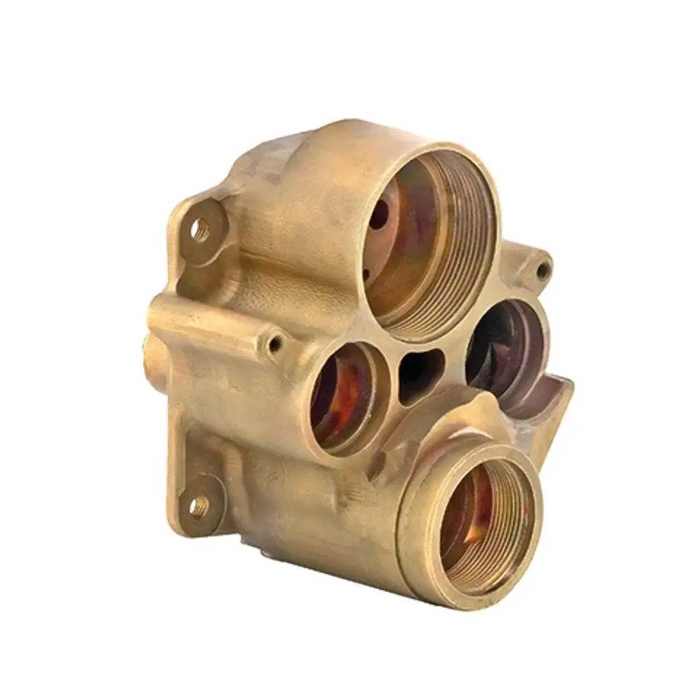 Adapter von Kludi mit mehreren Anschlüssen, verwendet zur Anpassung von vertauschten Wasserwegen. Metallkonstruktion mit verschiedenen Öffnungen.